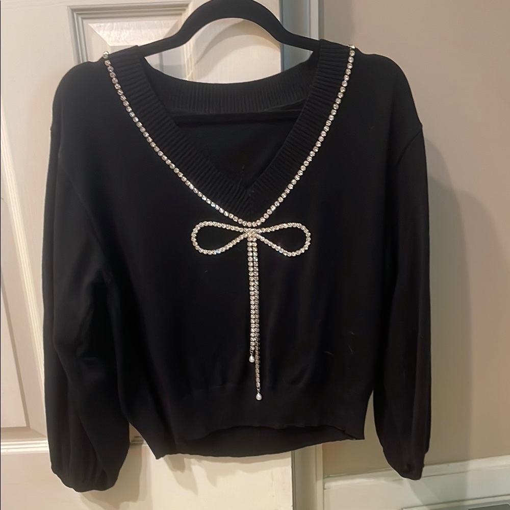 Elegant Black Sweater with Rhinestone Bow